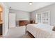 Comfortable bedroom with natural light, ample closet space, and a neutral color palette, ideal for relaxation at 1993 Haley Walk, Atlanta, GA 30318