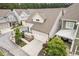 Aerial view shows townhome with charming curb appeal, driveway and landscaping at 1993 Haley Walk, Atlanta, GA 30318
