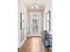 Bright foyer with hardwood floors and modern console table at 1993 Haley Walk, Atlanta, GA 30318