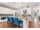 Modern kitchen with white cabinets, granite countertops, and stainless steel appliances at 1993 Haley Walk, Atlanta, GA 30318