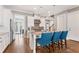 Bright kitchen with a center island, stainless steel appliances, and hardwood floors at 1993 Haley Walk, Atlanta, GA 30318