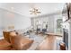 Comfortable living room with hardwood floors, fireplace, and ample seating at 1993 Haley Walk, Atlanta, GA 30318