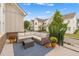 Relaxing outdoor patio with comfortable seating, colorful flowers and a view of the community at 1993 Haley Walk, Atlanta, GA 30318