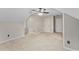 Large carpeted bedroom featuring neutral walls, ceiling fan, and a closet at 76 Barrington Farms Pkwy, Sharpsburg, GA 30277