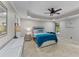 Large main bedroom with tray ceilings, a ceiling fan, and neutral carpeting at 76 Barrington Farms Pkwy, Sharpsburg, GA 30277