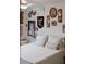 Cozy bedroom featuring a plush bed and eclectic wall decor at 351 Cherokee Ave, Atlanta, GA 30312