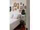 Lovely bedroom featuring a guitar and vintage eclectic wall decor at 351 Cherokee Ave, Atlanta, GA 30312