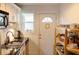 Bright kitchen featuring modern appliances, granite counters, and ample cabinet space at 351 Cherokee Ave, Atlanta, GA 30312
