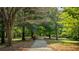 Shady park path lined with trees, creating a serene outdoor space at 351 Cherokee Ave, Atlanta, GA 30312