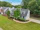 Aerial view of the house showing landscaping, driveway, and fenced in yard at 3970 Genoa Ct, Duluth, GA 30096