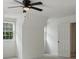Bedroom featuring a window and ceiling fan at 3970 Genoa Ct, Duluth, GA 30096