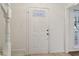 Bright, white front door with tile floor at 3970 Genoa Ct, Duluth, GA 30096