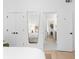 Spacious bedroom shows entry to walk-in closet and ensuite bathroom at 567 Ponce De Leon Ne Ave # 321, Atlanta, GA 30308