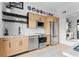 Modern kitchen features stainless steel appliances, white countertops, and wood cabinets at 567 Ponce De Leon Ne Ave # 321, Atlanta, GA 30308