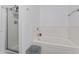 Clean and bright bathroom featuring a shower, bathtub and tiled surround at 11581 Kades Trl, Hampton, GA 30228