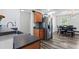 Bright kitchen features stainless steel appliances, wood cabinets and a dining area at 11581 Kades Trl, Hampton, GA 30228