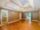 Large bedroom has hardwood floors and is connected to the bathroom and walk-in closet at 3290 Spain Rd, Snellville, GA 30039