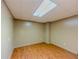 Bedroom with wood flooring, white walls, and bright light, ready for personalization at 3290 Spain Rd, Snellville, GA 30039