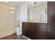 Bathroom features a glass shower, marble countertop, and dark wood cabinets at 3325 Piedmont Ne Rd # 2104, Atlanta, GA 30305