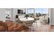Elegant dining area with hardwood floors, a modern round table, and comfortable seating at 3325 Piedmont Ne Rd # 2104, Atlanta, GA 30305