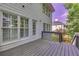 View of deck with white door and windows to the home and black railing at 6302 Manassas Nw Pass, Acworth, GA 30101