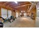 Unfinished basement with exposed wood framing, windows, and potential for customization at 6302 Manassas Nw Pass, Acworth, GA 30101
