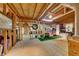 Spacious unfinished basement with wood framing and exposed beams, offering potential for customization at 6302 Manassas Nw Pass, Acworth, GA 30101