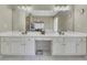 Main bathroom featuring dual vanities, ample storage, and a bright, clean design at 6302 Manassas Nw Pass, Acworth, GA 30101