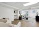 Finished basement with recessed lighting, neutral walls, and modern furnishings at 1606 Van Epps Se St, Atlanta, GA 30316