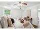 Inviting bedroom with wood flooring, ceiling fan, and comfortable bedding at 1606 Van Epps Se St, Atlanta, GA 30316