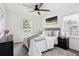 Bright bedroom filled with natural light, decorative rug, and stylish black nightstand at 1606 Van Epps Se St, Atlanta, GA 30316
