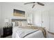 Comfortable bedroom with soft gray headboard, neutral bedding, and stylish nightstand at 1606 Van Epps Se St, Atlanta, GA 30316