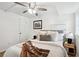 Cozy bedroom with a ceiling fan, white walls, and comfortable bedding at 1606 Van Epps Se St, Atlanta, GA 30316