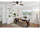 Office with built-in shelves, a ceiling fan, and natural light at 1606 Van Epps Se St, Atlanta, GA 30316