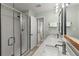Bright bathroom featuring a double vanity, a glass shower, and modern fixtures, perfect for everyday use at 2060 Candlewood Ne Ct, Marietta, GA 30066