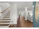 Inviting entryway with hardwood floors, stairs to the second floor, and a view of the living area at 2060 Candlewood Ne Ct, Marietta, GA 30066