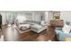 Bright and airy living room with hardwood floors, stylish furnishings, and an open layout at 2060 Candlewood Ne Ct, Marietta, GA 30066