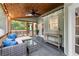 Relaxing screened-in porch with inviting furniture and stylish decor at 2060 Candlewood Ne Ct, Marietta, GA 30066