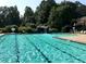 Large community pool with a waterfall feature and plenty of seating for residents to relax at 5396 Turnbill Nw Pt, Acworth, GA 30101