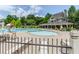 Resort-style community pool with lounge chairs and umbrellas for relaxing by the water at 5396 Turnbill Nw Pt, Acworth, GA 30101