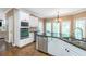 Bright kitchen with stainless steel appliances, granite countertops, and beautiful hardwood floors at 5396 Turnbill Nw Pt, Acworth, GA 30101