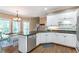 Well-lit kitchen with stainless steel appliances, granite countertops, and eat-in area at 5396 Turnbill Nw Pt, Acworth, GA 30101