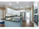 Modern kitchen features stainless steel appliances, granite countertops, and ample cabinet space at 5396 Turnbill Nw Pt, Acworth, GA 30101