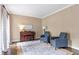 Cozy living room with natural light, wood floors, and comfortable seating at 5396 Turnbill Nw Pt, Acworth, GA 30101