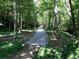 Picturesque nature trail winding through a serene wooded area, ideal for hiking and enjoying the outdoors at 5396 Turnbill Nw Pt, Acworth, GA 30101