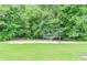 Community sand volleyball court with well-kept grassy surroundings for casual games at 5396 Turnbill Nw Pt, Acworth, GA 30101