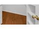 Walk-in closet featuring hardwood floors and built-in shelving at 10865 Misty Moon Ct, Alpharetta, GA 30022