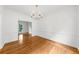 Dining room featuring wood floors and white wall at 10865 Misty Moon Ct, Alpharetta, GA 30022
