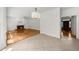 Spacious living room with a fireplace, hardwood floors, and an open layout at 10865 Misty Moon Ct, Alpharetta, GA 30022