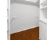 Spacious walk-in closet with custom shelving and drawers, offering ample storage space at 10865 Misty Moon Ct, Alpharetta, GA 30022
